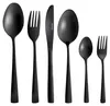 A set of black cutlery arranged in a line against a white background. Náhled obrázku produktu