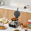 A bubble waffle maker is shown on a kitchen counter, with waffles being made and served. Produktbild-Vorschau