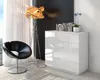 A modern living room scene featuring a white chest of drawers, a black accent chair, and a unique floor lamp. Produktbild-Vorschau