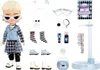 A doll and its accessories are laid out on a white background. Anteprima dell’immagine prodotto