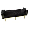 A black velvet sofa bed with gold legs and decorative studs. Anteprima dell’immagine prodotto