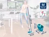A woman is using a mop in a kitchen setting, with various dimensions and size information overlaid on the image. Produktbild-Vorschau