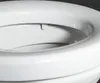 A close-up view of the rim of a white toilet bowl. Produktbild-Vorschau