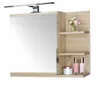 A bathroom cabinet with a mirror and shelves, featuring a light and decorative items. Produktbild-Vorschau