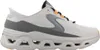 A side view of a single athletic shoe. Voir les images du produit