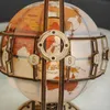 A close-up view of a wooden 3D globe puzzle with visible map details and numbered markers. Náhľad obrázku produktu
