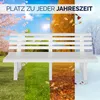 A white garden bench is shown in front of a collage of four different seasons: spring with blooming trees, summer with green grass and a sunny sky, autumn with falling leaves, and winter with snow. Náhled obrázku produktu