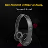 A pair of black wireless headphones is displayed against a dark background with text overlays. Produktbild-Vorschau