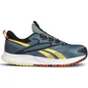 A side view of a blue Reebok safety shoe with yellow accents. Produktbild-Vorschau