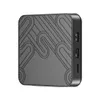 A product shot of a black smart TV box with a decorative pattern on top. Anteprima dell’immagine prodotto