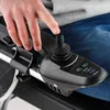 A close-up view of a person's hand operating a joystick control on a wheelchair. Náhľad obrázku produktu