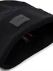 A close-up view of a black beanie hat with a black BOSS logo patch. Voir les images du produit