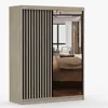 A wardrobe with a mirrored door and slatted panels, reflecting a bedroom interior. Náhled obrázku produktu