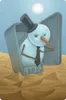 A snowman in a suit and top hat is melting in a desert landscape, emerging from a coffin-like structure. Náhled obrázku produktu