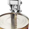 A close-up view of a can opener piercing the lid of a tin can. Produktbild-Vorschau