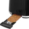 A close-up view of a black toaster with its crumb tray extended, filled with crumbs. Podgląd zdjęcia produktu