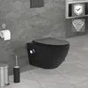 A modern black wall-hung toilet with a bidet function is shown in a bathroom setting with concrete-like walls and tiled floor. Accessories like a toilet paper holder, trash can, and toilet brush are also visible. Podgląd zdjęcia produktu