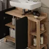 A bathroom vanity with a sink and storage cabinets. Anteprima dell’immagine prodotto