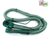 A green vacuum cleaner hose and handle are laid out on a white background. Produktbild-Vorschau
