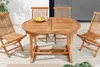 An oval wooden garden table with chairs on a wooden deck. Produktbild-Vorschau