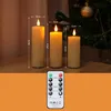 Three LED candles of different heights are displayed on a wooden surface, with a Christmas tree and ornament in the background. A remote control is shown in the foreground. Voir les images du produit