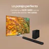 A Samsung QLED TV and soundbar are displayed together, suggesting a perfect pairing. Produktbild-Vorschau