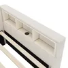 Close-up view of the headboard of a bed, showing storage compartments and a charging port. Anteprima dell’immagine prodotto