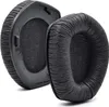 Two black headphone ear pads are shown on a white background. Produktbild-Vorschau