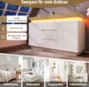 A collage of images showcasing a white sideboard with LED lighting and different room settings. Voir les images du produit