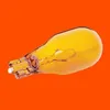 A close-up studio shot of a single amber-colored light bulb against an orange background. Produktbild-Vorschau