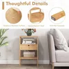A bamboo nightstand with books, a vase of flowers, and a basket is shown next to a sofa. The top of the image features marketing text and close-up shots of the product's features. Podgląd zdjęcia produktu