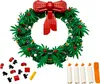 A LEGO Christmas wreath and accessories on a white background. Podgląd zdjęcia produktu