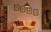 A living room scene with a sofa, coffee table, and bookshelf. Náhled obrázku produktu