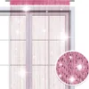 A string curtain hanging in front of a window. Náhled obrázku produktu