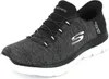 A studio shot of a single black and gray Skechers shoe. Produktbild-Vorschau