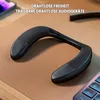 A neck speaker is placed on a desk mat next to a keyboard and a phone. Produktbild-Vorschau