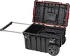 An open black rolling tool box with a red seal around the lid, on a white background. Voir les images du produit