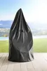 A hanging chair covered by a protective cover, placed on a wooden deck with a scenic background of mountains and a body of water. Produktbild-Vorschau
