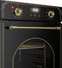 A close-up view of the control panel and handle of a black oven with gold accents. Podgląd zdjęcia produktu