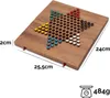 A Chinese checkers board game made of wood, with colored marbles. Produktbild-Vorschau