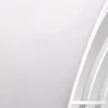 A close-up view of a white fabric material, possibly a lampshade, with curved white structures in the background. Náhľad obrázku produktu