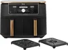 A black and gold Ninja Foodi MAX DualZone air fryer is shown from the front, with two black air fryer baskets placed in front of it. Produktbild-Vorschau