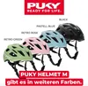Four Puky helmets in different colors are displayed side-by-side with their color names labeled above them. A Puky logo and slogan are at the top, and a product title and availability text are at the bottom. Náhľad obrázku produktu