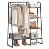 A SONGMICS clothing rack with various clothing items and storage boxes. Náhled obrázku produktu