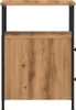 A front view of a wooden nightstand with black metal legs. Voir les images du produit