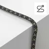 A close-up of a braided black and tan cable resting on a white surface. Anteprima dell’immagine prodotto