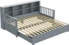 A gray daybed with a pull-out trundle bed and built-in shelving unit. Náhled obrázku produktu