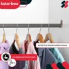A clothes rail with several garments hanging on it, showcasing product features. Náhľad obrázku produktu