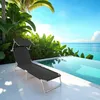 A black lounge chair with a canopy sits on a white patio next to an infinity pool overlooking the ocean. Náhled obrázku produktu