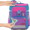 Hands are shown attaching decorative patches to a child's backpack. Náhľad obrázku produktu